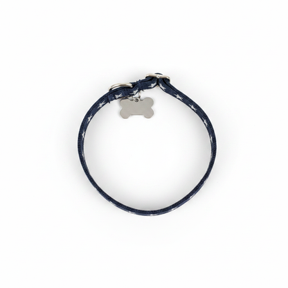 Navy blue star pattern dog collar flat lay top-down view on white background