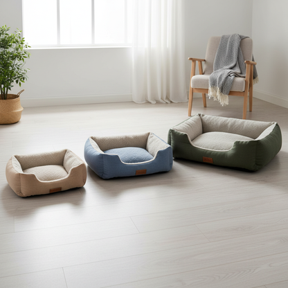 Three bolster dog beds in olive green dusty blue and beige in Scandinavian living room